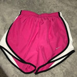 Hot Pink, White and Black Nike shorts